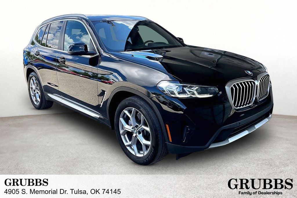 2023 BMW X3 xDrive30i in Jet Black — front three-quarter view